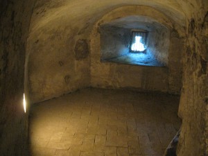 The castle once held prisoners who helped excavate the nearby Roman ruins of Ostia Antica